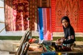 A Local Woman Weaving Tenun Ikat With Traditional Loom Royalty Free Stock Photo