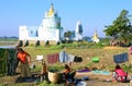 Local women doing laundry near Buddhist temple, Amarapura, Myanmar