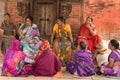 Local women gathering on a street of Nepal's capital city Kathmandu in a sunny afternoon