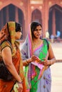 Local women standing in the courtyard of Jama Masjid in Fatehpur Sikri, Uttar Pradesh, India