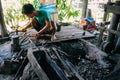 A local worker forging iron at Inle Lake. Royalty Free Stock Photo