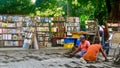 Local workers fixing the pavement of Plaza de Armas Square, the oldest of the four Colonial squares in Old Havana Royalty Free Stock Photo