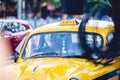 Local Yellow taxi on the street in Kolkata India Royalty Free Stock Photo