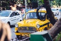 Local Yellow taxi on the street in Kolkata India Royalty Free Stock Photo