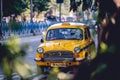 Local Yellow taxi on the street in Kolkata India Royalty Free Stock Photo