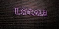 LOCALE -Realistic Neon Sign on Brick Wall background - 3D rendered royalty free stock image