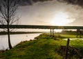 Localised flooding seen by a river bursting its banks after a spring tide.