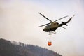 Localized wildfire with the helicopter dropping water