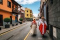 Locals in Canarian traditional clothes walk along the street of Puerto de la Cruz. Day of Canary Islands. Tenerife.