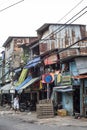 Locals have a quiet time in a poor street of Ho Chi Minh City