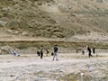 locals playing cricket in Karimabad, Hunza Valley, Karakoram Highway, Pakistan