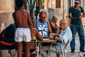 Locals playing dominoes in Havana city, Cuba.