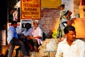 Locals sit in Varanasi, India. Royalty Free Stock Photo