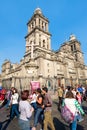 Locals and tourists next to the Mexico City Metropolitan Cathedral
