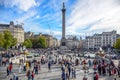 Locals and tourists visiting and hanging out at Trafalgar Square in the City of Westminster, London, England, UK Royalty Free Stock Photo