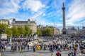 Locals and tourists visiting and hanging out at Trafalgar Square in the City of Westminster, London, England, UK Royalty Free Stock Photo