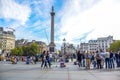 Locals and tourists visiting and hanging out at Trafalgar Square in the City of Westminster, London, England, UK Royalty Free Stock Photo