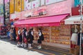 Locals and tourists walking at Tokyo's Harajuku's Takeshita street