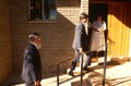 Locals walking into a Church in South Africa Royalty Free Stock Photo