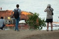 Locals watch salvaging of wrecked ship Royalty Free Stock Photo