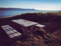 Camping wood table with views to icelandic fjord