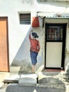 The Girl in Red murals