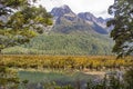 Mirror Lake with Earl Mountains in the background  in Fiordland National Park, New Zealand. Royalty Free Stock Photo