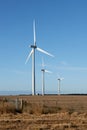 Three wind turbines on a farm in the Australian countryside. Royalty Free Stock Photo