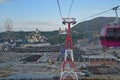 Near sunset riding on Vinpearl cable car approaching Hon Tre Island with wide view of park under construction, Nha Trang, Vietnam Royalty Free Stock Photo