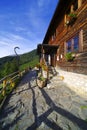 Autumn sunny day at the old wooden Curmatura chalet in Piatra Craiului National Park. Royalty Free Stock Photo