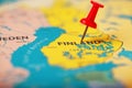 The location of the destination on the map of Finland is indicated by a red pushpin Royalty Free Stock Photo