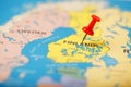 The location of the destination on the map of Finland is indicated by a red pushpin Royalty Free Stock Photo