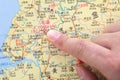 Location of North Korea`s capital Pyongyang on a finger map Royalty Free Stock Photo