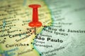 Location Sao Paulo city in Brazil, red push pin on the travel map, marker and point close-up, tourism and trip concept