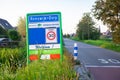 Place name sign of Reeuwijk-dorp, Holland Royalty Free Stock Photo