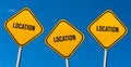 Location - yellow signs with blue sky