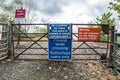 Loch Awe, Argyll , Scotland - May 15 2017 : Sign with instructions how to tresspass the railway