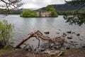 LOCH AN EILEIN, NEAR AVIEMORE/SCOTLAND - MAY 16 : Castle in the Royalty Free Stock Photo