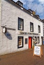 Loch Fyne Whiskies on main Street in the town centre - Inveraray - Argyll & Bute Royalty Free Stock Photo