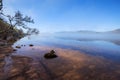 Loch Ness over the morning fog. Royalty Free Stock Photo