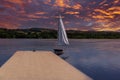 Loch Semple Pontoon and Small Sail Boat with a dramatic blazing Red Sunset