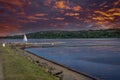 Loch Semple Pontoon and Small Sail Boats as the sun goes down leaving a blazing red sunset sky