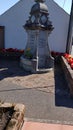 Lochmaben village, L9ckerbie. Floral displays at memorial fountain