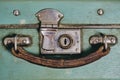 Lock and brown leather handle old vintage suitcase. Royalty Free Stock Photo