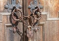 Lock and chain on an old door Royalty Free Stock Photo