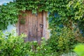 Lock on door of an old abandoned house. Abandoned housing durin Royalty Free Stock Photo