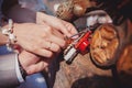 The lock in hands of newlyweds Royalty Free Stock Photo