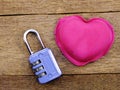 Lock with the heart as a symbol of love vintage on wooden background Royalty Free Stock Photo