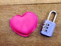 Lock with the heart as a symbol of love vintage on wooden background Royalty Free Stock Photo