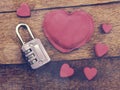 Lock with the heart as a symbol of love on wooden background Royalty Free Stock Photo